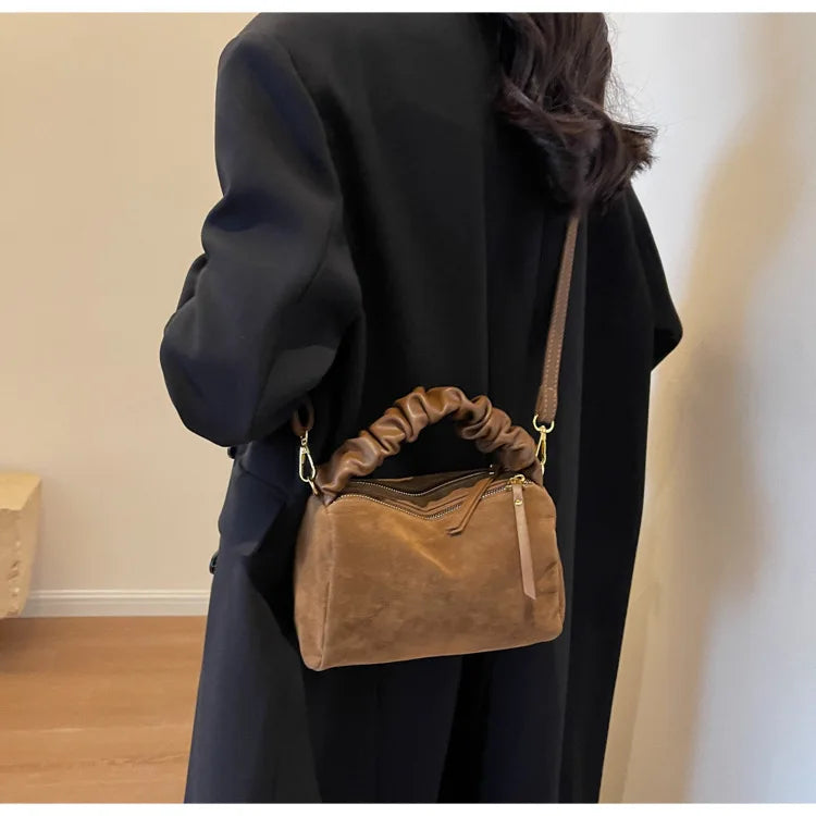 Borsa in pelle scamosciata